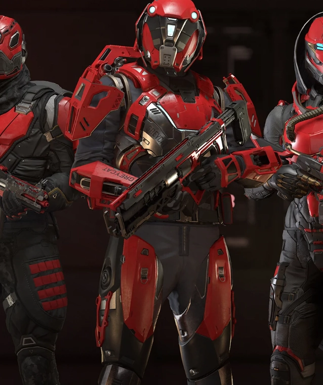 Star Citizen characters: Group of futuristic soldiers in red armor, equipped with advanced weapons, standing together in a dark environment.